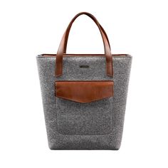 Elevate your everyday style with our Exclusive Women's Felt Shopper Bag, designed with luxurious leather inserts. Crafted from premium felt, this spacious and durable bag offers both functionality and sophistication. The rich leather accents add a touch of elegance, making it the perfect accessory for shopping, work, or weekend outings. With its unique blend of materials and timeless design, this exclusive shopper bag is a must-have for those who appreciate quality and style. Dimensions: 14.6 x 16.5 x 4.7 inches. Rectangular Bucket Bag With Leather Handles For Business, Luxury Leather Trim Laptop Bag For Daily Use, Functional Leather Tote Bucket Bag, Rectangular Briefcase With Leather Trim For Daily Use, Modern Bucket Bag With Leather Trim, Modern Bucket Bag With Leather Trim Tote, Daily Use Wool Bag With Leather Handles, Daily Use Wool Bags With Leather Handles, Wool Tote Bag For Daily Use