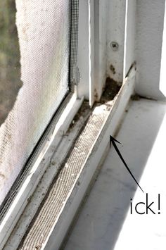 a window sill with the word tick on it and an arrow pointing up to the side