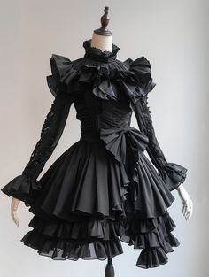 A cute black gothic dress with ruffles and a collar, displayed on a mannequin in anime style Romantic Gothic Fashion, Coven Dress, Black Victorian Dress, Black Gothic Dress, Ruffle Trend, Rococo Dress, Odd Fashion, Gothic Dresses, Fashion Show Dresses