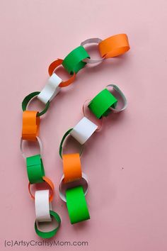 the paper chain is made to look like it has been cut out and put together