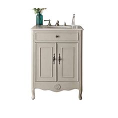 a bathroom vanity with two doors and a sink in the middle, on a white background