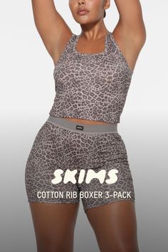 The soft, stretchy, ultra-comfy Cotton Rib Boxers she loves are wrapped and ready for gifting in limited-edition 3-packs. Add the corresponding Cotton Rib Tank bundle for selfie-worthy sets she’ll look and feel so good in. This pack features styles in Stone, Snow Leopard Print, and Soot. Fits true to size. | SKIMS Boxer 3-Pack | Black | Medium | Cotton Rib Snow Leopard Print, Snow Leopard, Black Xs, She Loves, Black Media, Christmas List, Breathable Fabric, Leopard Print, Limited Edition