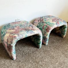 two stools sitting next to each other on the floor