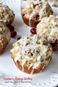 cranberry orange muffins on a white plate