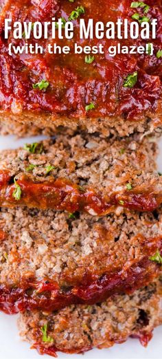 meatloaf with sauce and parsley on top, cut into slices to eat