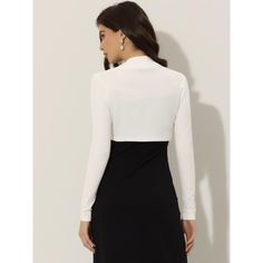 This versatile shrug is a must-have for any fashion-forward wardrobe. Its soft and lightweight knit material makes it comfortable to wear, while the long sleeves and crop length offer a chic and modern look. The clean, collarless silhouette is precisely cropped above the waist, making it the perfect cover-up for any occasion or event. You can easily pair it with a white dress or sleeveless dress to showcase your graceful gesture. With its contemporary design and effortless style, this shrug is s Elegant Stretch Open Front Top, Elegant Open Front Stretch Top, Chic Long Sleeve Shrug For Layering, Stretch Long Sleeve Shrug For Layering, White Long Sleeve Shrug For Fall, White Stretch Long Sleeve Shrug, Elegant Long Sleeve Stretch Shrug, Chic Long Sleeve Fall Shrug, Chic Long Sleeve Shrug For Fall