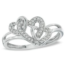 Treat the one you love to this delightfully romantic look. Fashioned in sleek sterling silver, three open hearts are each lined with glittering diamonds and linked together across the double split shank. Sparkling with 1/7 ct. t.w. of shimmering diamonds and a bright polished shine, this ring is a look she's certain to adore. Custom made to fit her ring size. Sterling silver rings cannot be resized after purchase. Cute Promise Rings, Heart Promise Rings, Triple Heart, Black Gold Jewelry, Engagement Ring White Gold, Morganite Engagement Ring, Two Hearts, Diamond Cluster Ring, Rose Gold Engagement Ring