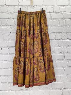 Twirl the day away in this gorgeous, buttery soft skirt. The long, full design is flattering to every shape. Made of vintage rasgulla silk saris. Each piece will be unique. Available in 2 sizes S/M 4-10 L/XL 12-18 Approximately 38” long Care Instructions: Hand wash and line dry for longest life. Disclaimer: The material used in this style is repurposed, vintage material. Small imperfections may be present. Fabrics may have small threads or holes in the layers. Small stains may be found. Soft Skirt, Repurposed Vintage, Vintage Material, M 4, Tie Dye Skirt, Maxi Skirt, Care Instructions, The Day, Hand Wash