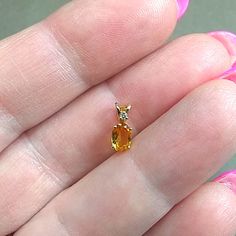 Vintage 14kt Gold In Excellent Condition Cid By Clyde Duneier Mini Charm Pendant 14kt Solid Gold Prong Set W/ Split Bail Natural Cut Oval Citrine Natural Diamond Accent Size: App 3/8" L X 3/16" W .4 Grams T.W. Just Tiny And Adorable Luxury Yellow Oval Jewelry, Fine Jewelry Oval Yellow Jewelry, 14k Gold Jewelry With Yellow Gemstone Accents, Yellow 14k Gold Jewelry With Gemstone Accents, Fine Jewelry Yellow Oval Jewelry, Oval Yellow Sapphire Jewelry With Prong Setting, Yellow Oval Citrine Jewelry, Fine Yellow Oval Jewelry, Fine Jewelry Yellow Sapphire In Oval Shape