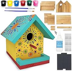 a bird house with paint, glue and markers