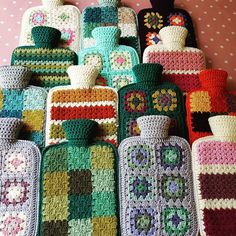 many crocheted items are arranged in rows