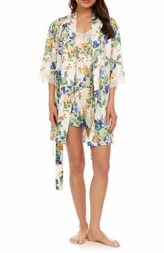 Silky-soft satin refines the flowy silhouette of these floral pajamas pairing a lace-trimmed camisole with coordinating shorts and a matching robe. 18" top center front length; 1 1/2" inseam; 26" leg opening; 11 1/2" front rise; 13" back rise; 35" robe length (size Medium) Includes two-piece short pajamas and short robe Top has V-neck; adjustable straps Bottoms have elastic waist Robe has three-quarter sleeves; removable tie belt 100% polyester Hand wash, dry flat Imported Spring Satin Sets For Daywear, Silk Summer Sets For Daywear, Summer Silk Daywear Sets, Summer Silk Sets For Daywear, Summer Lace Sleep Sets, Spring Bedtime Satin Sets, Spring Silk Sleepwear, Silk Sleepwear For Spring Season, Silk Floral Print Sleepwear For Spring