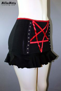 DETAILS Custom-made pentagram mini skirt created using red satin ribbon with black grommet tape on the front and a red elastic waist band. LENGTH: 13" (fits at hip) MODEL: Mannequin has 37" hip VIEW SIZE GUIDE CARE: Hand wash cold, hang dry. SHIPPING: Made When Ordered Please allow 1-2 WEEKS to ship. Model Mannequin, Red Satin, Waist Band, Satin Ribbon, Cheer Skirts, Size Guide, Mini Skirt, Elastic Waist, Custom Made