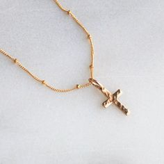 "Dainty Cross Necklace & Gift for Her This dainty cross necklace is perfect for yourself or as a meaningful, special gift. Designed dainty for everyday wear in high quality 14kt gold filled or sterling silver to last over time!  D E T A I L S *Dainty 16mm cross hammered hand finish  *Choose your chain style *100% 14kt Gold-Filled or Sterling Silver LENGTH *Please select from the drop down selection. *The standard length is normally 18\". *Model is wearing 16\" in Photos. HOW TO PERSONALIZE *Select your choices from the drop down menu to create your custom design. ∙ EXTRA LOVE ∙ Handcrafted just for you in sunny Arizona by a team of talented women. All of our jewelry comes gift packaged! We are happy to leave a note if this is a special gift, just let us know in the message box at checkout. Adjustable Cross Necklace With Delicate Chain, Adjustable Cross Necklaces With Delicate Chain, Adjustable Delicate Chain Cross Necklaces, Minimalist Cross Pendant Necklaces For Baptism, Dainty Adjustable Cross Necklace, Minimalist Cross Pendant Necklace For Baptism, Dainty Cross Necklace For First Communion, Dainty Cross Pendant Necklace For Baptism, Dainty Cross Necklace For Baptism