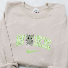 The Nike x Toothless Cartoon Embroidered Sweatshirt is a must-have for fans of How to Train Your Dragon. With its Toothless Cartoon, Nike Cartoon, Disney Character Shirts, Universal Shirts, Best Family Gifts, Limited Edition Shirt, Cartoon Embroidery, Perfect Birthday Gift, Toothless