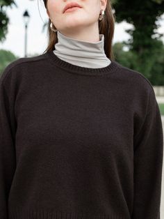 A basic that is always needed, this sweater is lightweight yet still warm and has the ideal length for wearing with any bottom. Made of a soft, cozy yarn, it is a foundation to start your layering look upon. Classics never go out of style, just like you. Details: Classic lightweight crewneck pullover Loose fit Ribbed detail at hem, cuff and neck Straight hem Drop shoulder Fabric: 58% Cotton, 21% Acrylic, 10% Nylon, 9% Polyester, 2% Spandex. Soft, cozy hand feel. Medium weight knit. Imported. Fit Go Out, Out Of Style, Medium Weight, Drop Shoulder, Like You, To Start, Going Out, Layering, Foundation