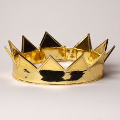 The one and only shiny Gold CROWN is made from smooth patent leather with angled tips. Velcro adjustable strap in the back allows for different head sizes and hair styles. This is a crown inspired by Rihanna's Anti Album Cover. Rihanna Crown, Headpiece Accessories, Mermaid Crown, Black Halo, Tie Headband, Crystal Tiaras, Gold Halo, Gold Crown, The Bad