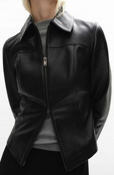 A streamlined, modern profile updates the look of a smooth leather jacket fashioned with a two-way front zipper for additional styling options. Two-way front zip closure Spread collar Lined Leather Professional leather clean Imported Leather Jacket With Zipper Closure For Work, Elegant Black Leather Jacket With Zipper Closure, Sleek Formal Leather Jacket With Zipper Closure, Sleek Leather Jacket With Zipper Closure, Elegant Leather Jacket With Zip Fly, Leather Biker Jacket For Business, Leather Outerwear With Zipper For Work, Leather Outerwear With Zipper Closure For Work, Sleek Biker Jacket For Office In Fall