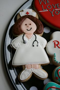 decorated cookies on a black and white plate