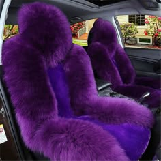 the interior of a car with purple fur