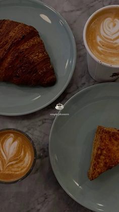 two plates with pastries on them next to a cup of cappuccino