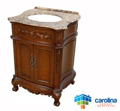 a wooden sink cabinet with marble top