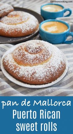 two plates filled with powdered sugar covered pastries on top of a striped table cloth