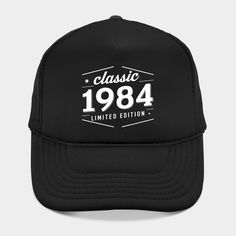 a black trucker hat with the words classic 1994 printed on it and white lettering