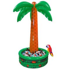 an inflatable palm tree is shown with a bird perched on the top one