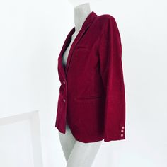 Shoulders 17 inches Sleeves 24 inches Bust 40 inches Waist 36 inches Length 27 inches Very vintage Lauren Hutton. This jacket is such a beautiful shade of wine red. It's not as dark as most wine reds. It look beautiful with blue denim. A very fun color for fall. Excellent condition. Winter Burgundy Single Breasted Blazer, Red Velvet Outerwear For Fall, Red Velvet Outerwear For Winter, Vintage Velvet Blazer For Fall, Fitted Vintage Burgundy Outerwear, Winter Burgundy Single-breasted Blazer, Red Velvet Winter Outerwear, Fitted Vintage Red Outerwear, Vintage Red Winter Outerwear