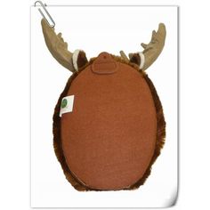 a stuffed animal with horns and antlers on it's head is hanging from a hook