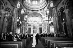 the bride and groom are walking down the aisle at their wedding ceremony in an old church