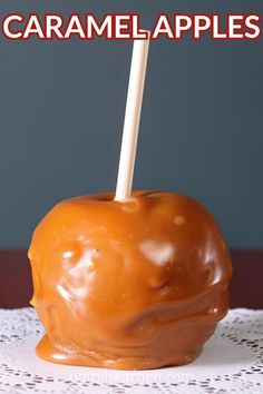 caramel apples on a white doily with the words caramel apples above them