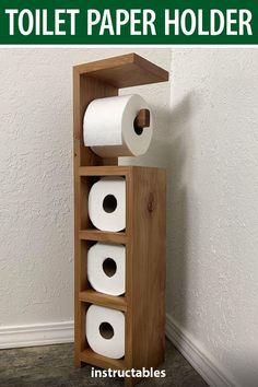 a wooden shelf with four rolls of toilet paper in it and the words how to build a wood toilet paper holder