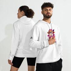 Get ready to embrace warmth and showcase your love for books with our 'Book Dragon' adidas Fleece Hoodie. This comfy everyday wear is not just a cozy garment but also a symbol of your unique taste in fashion! Made from a blend of 70% cotton and 30% recycled polyester, this hoodie offers superior plushness and heat retention, perfect for those who appreciate both style and comfort. Old Logo, Adidas Brand, Women Long Sleeve Dress, Hoodies Mens, Men's Button Down Shirt, Mens Sportswear, Fancy Outfits, Sportswear Women