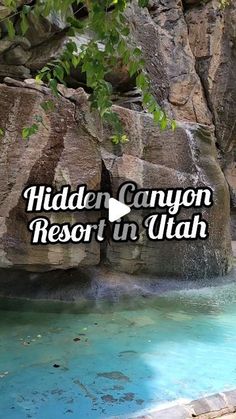 the hidden canyon resort in utah has a waterfall and blue pool with water running down it