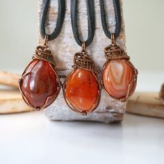 Strengthen your individuality and creativity when wearing this carnelian pendant necklace. Each carnelian pendant is handmade with positive vibes and attention to detail. You can wear this carnelian statement necklace on either side, due to the pendant's handcrafted reversible design. Each stone ranges in shape, size and shade of its colour, creating a unique pendant for you that won't be duplicated. Stone is natural, polished raw red-orange carnelian Pendant measures approx. height 1.5-2” and w Red Carnelian, Raw Crystal Jewelry, Carnelian Necklace, Carnelian Pendant, 40th Birthday Gifts, Birthday Gift For Him, Unique Pendant, Gifts For Husband, Necklace Pendant