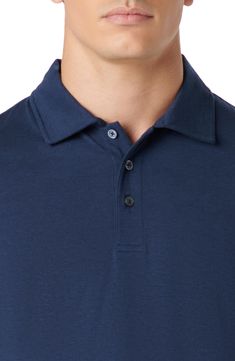 Fend off the sun's rays in this polo made from stretchy performance fabric with UPF sun protection. 28" length Button half-placket Spread collar Short sleeves UPF 50+ sun protection 88% polyester, 12% spandex Machine wash, dry flat Imported Navy Cotton Moisture-wicking Polo Shirt, Summer Collared Polo Shirt With Moisture-wicking, Navy Moisture-wicking Collared Polo Shirt, Navy Collared Moisture-wicking Polo Shirt, Navy Collared Polo Shirt With Moisture-wicking, Navy Casual Polo Shirt For Golf, Casual Navy Polo Shirt For Golf, Navy Collared Polo Shirt For Golf, Collared Moisture-wicking 4-way Stretch Polo Shirt