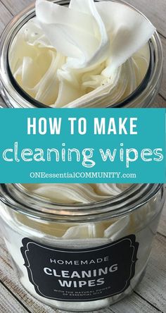 a jar filled with cleaning wipes on top of a wooden table