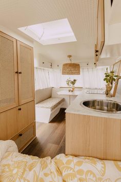 the interior of a camper is clean and ready to be used as a kitchen