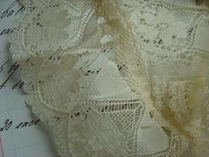 Antique Wedding Lace Scrumptious Victorian Lace, old and  beautiful lace has such a delicate and feminine feel and is just a dreamy color. measures 2 yards x 1 3/4" You can find other lace, linens, and ribbon in the Studio here:  http://www.etsy.com/shop/reginasstudio?section_id=5881803 Looking for more?  See all the antique, vintage, and retro items in the Studio by clicking here:  http://www.etsy.com/shop/reginasstudio Vintage Beige Scalloped Lace, Off White Lace With Lace Trim For Wedding, Victorian Cream Lace For Vintage Events, Ecru Lace With Lace Trim For Wedding, Vintage Scalloped Lace For Wedding, Victorian Scalloped Lace For Wedding, White Scalloped Lace For Vintage Events, Vintage Lace Patchwork For Wedding, Vintage White Lace Patchwork For Wedding