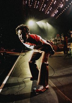 a man riding a skateboard on top of a stage