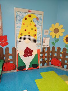 a classroom door decorated with fall decorations