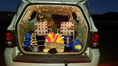 the back end of a van with decorations in it