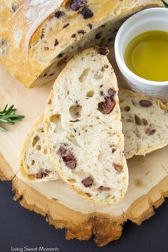 sliced bread and olive oil on a cutting board