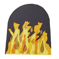 a paper cut out of yellow and black flames