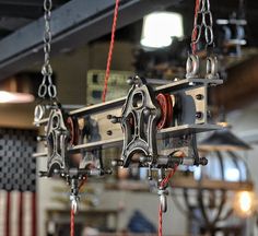 an old fashioned machine is hanging from the ceiling