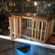 the inside of a wooden cabinet in a shop