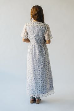 Introducing the Engstrom Floral Midi Dress - a delightful blend of chic and playful. Its elegant ivory bodice pairs perfectly with the feminine lavender floral pattern. Complete with a midi length, this dress is a must-have for any occasion. Details self: 50% viscose + 50% polyester lining: 100% cotton Fabric Care Guide Here Sizing & Fit Measurements are approximate and taken while laying flat across the front. Not doubled. x-small: bust = 18"; length = 51" small: bust = 19"; length = 51.5" medi Mid-length Ditsy Floral Dress For Garden Party, Feminine Tea Length Maxi Dress, Modest Ditsy Floral Midi Dress For Garden Party, Lavender Spring Wedding Dress, Lavender Maxi Dress For Garden Party, Mid-length Ditsy Floral Print Maxi Dress For Garden Party, White Modest Dress With Ditsy Floral Print, Fitted Lavender Midi Dress For Garden Party, Garden Party Ditsy Floral Print Maxi Dress