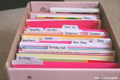 a pink box filled with lots of folders